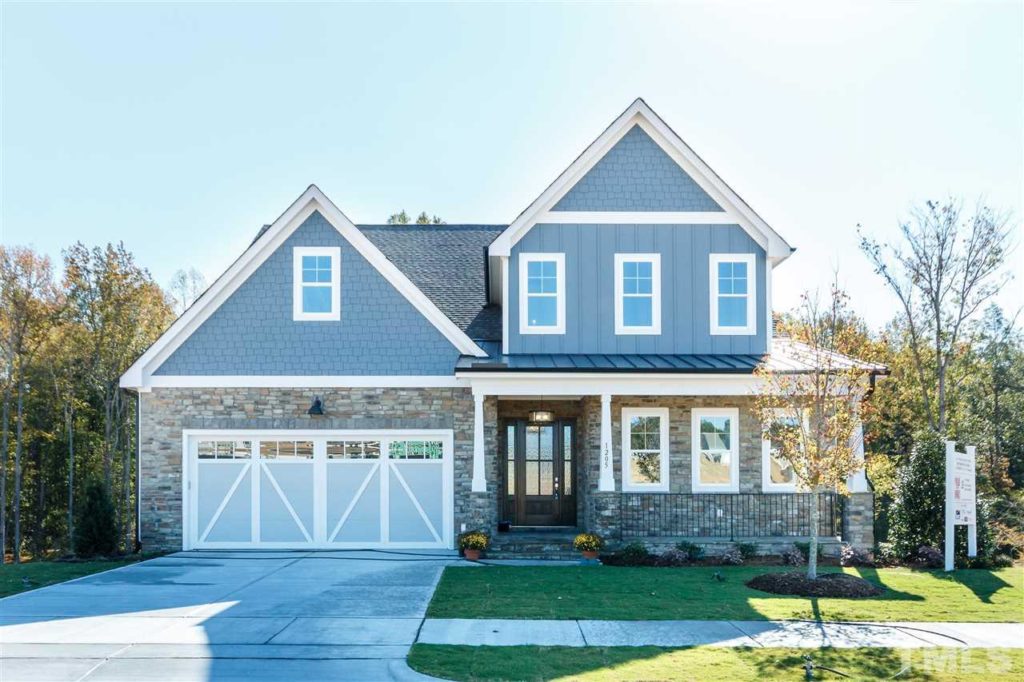 A beautiful Custom home that is main level living with a finished basement! Huge Gourmet Kitchen that even has an herb garden overlooking the open family and dining rooms! Unbelievably large bonus room in the basement with built-in bar. Room for pool table and movie theater or just creating the best place possible to watch the game!